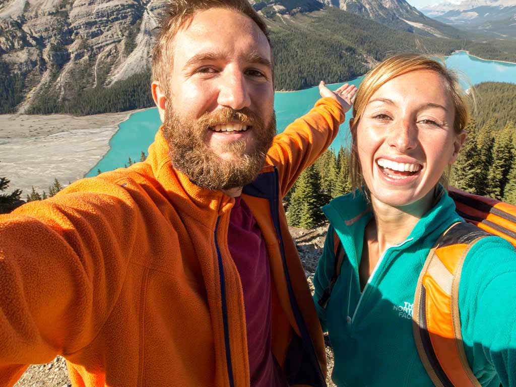 Young couple taking a selfie while travelling.