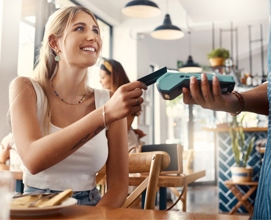 Girl paying with credit card
