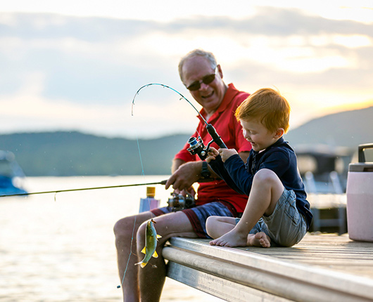 Grandpa and grandson fishing