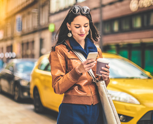 Woman in the city on the phone